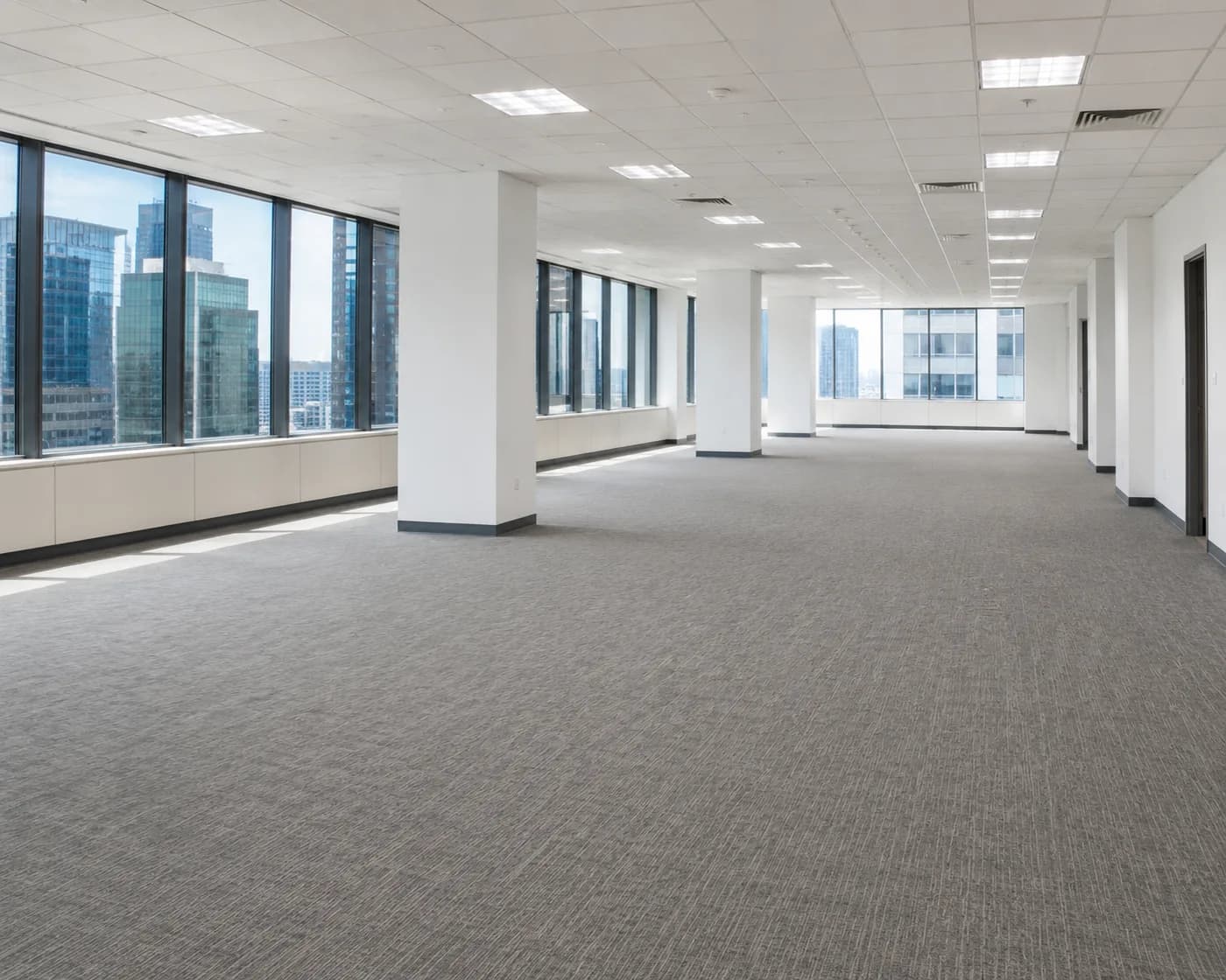 A finished open plan office floor in daylight, clean and ready to be used